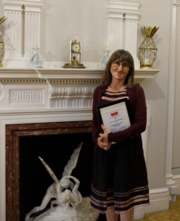 Baroness Beeban Kidron OBE who is holding The Vicky Ireland Award certificate